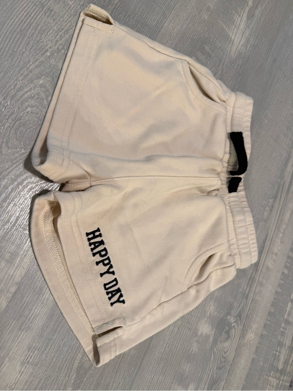 Little Bipsy Cream Shorts with Black 'HAPPY DAY' Accent
